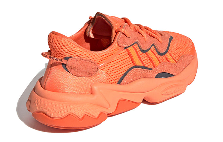 Adidas originals ozweego collection low top athletic casual shoes orange teens