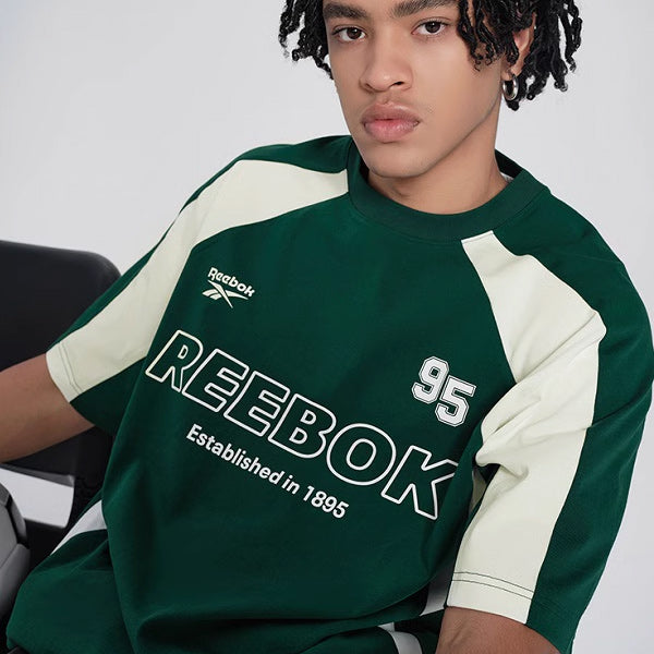 Reebok erkaklar futbolkasi