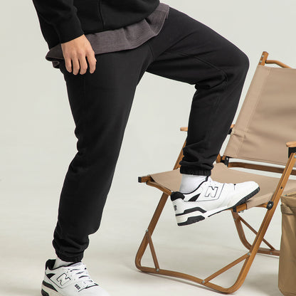 New Balance Solid Simple Trikotajli erkaklar qora sport shimlari