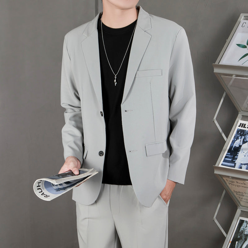 Ofisga qarshi engil hashamatli moda tasodifiy chiroyli bo'sh Gonkong uslubidagi gangster chiroyli ko'ylagi universal koreys versiyasi trendi uzun yengli kostyum erkaklar modellari