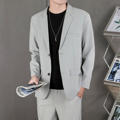 Ofisga qarshi engil hashamatli moda tasodifiy chiroyli bo'sh Gonkong uslubidagi gangster chiroyli ko'ylagi universal koreys versiyasi trendi uzun yengli kostyum erkaklar modellari