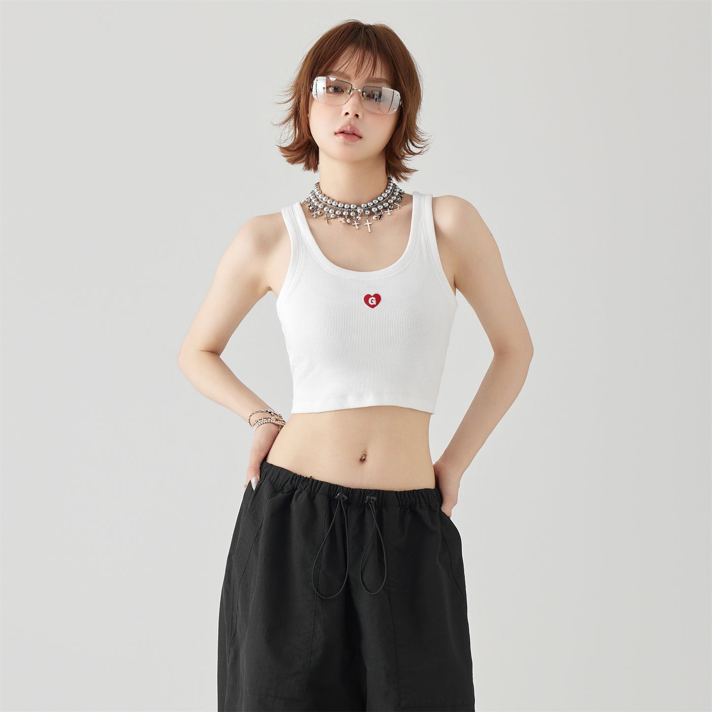 Golfkrossning asosiy modellari kashtado'zlikni yaxshi ko'radi tashqi kiyim yengsiz kamzulga kalta shirin salqin uslubdagi achchiq qizning pastki ichki qismi yuqori yelek ayollar