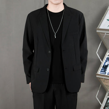 Ofisga qarshi engil hashamatli moda tasodifiy chiroyli bo'sh Gonkong uslubidagi gangster chiroyli ko'ylagi universal koreys versiyasi trendi uzun yengli kostyum erkaklar modellari