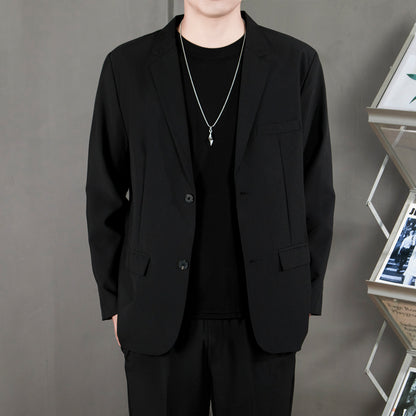 Ofisga qarshi engil hashamatli moda tasodifiy chiroyli bo'sh Gonkong uslubidagi gangster chiroyli ko'ylagi universal koreys versiyasi trendi uzun yengli kostyum erkaklar modellari
