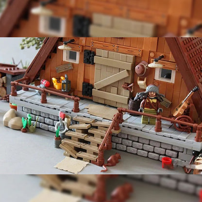 LEGO g'oyalari "O'rmon yog'och uyi" (21338)