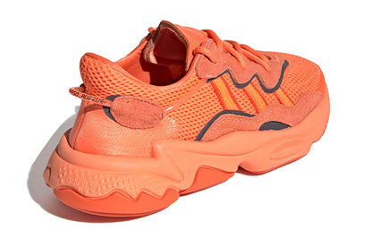 Adidas originals ozweego collection low top athletic casual shoes orange teens