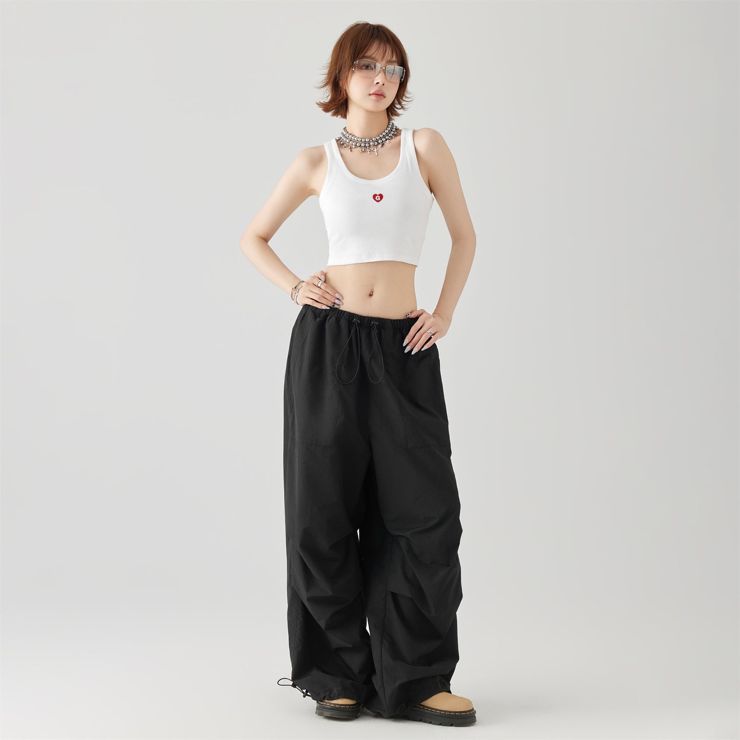 Golfkrossning asosiy modellari kashtado'zlikni yaxshi ko'radi tashqi kiyim yengsiz kamzulga kalta shirin salqin uslubdagi achchiq qizning pastki ichki qismi yuqori yelek ayollar