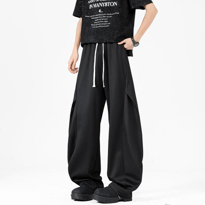 Paddy Julia sof rangdagi plili dekonstruksiyalangan birlashma keng oyoqli Amerika minimalist uslubidagi asosiy bo'lim bo'sh drape tasodifiy ko'p qirrali kundalik ishton erkaklar va ayollar bir xil uslubda