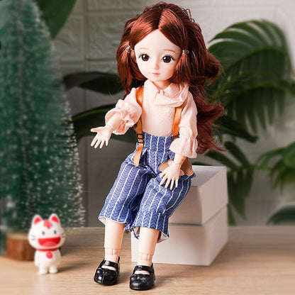 Tumi Barbie libosli qo'g'irchog'i