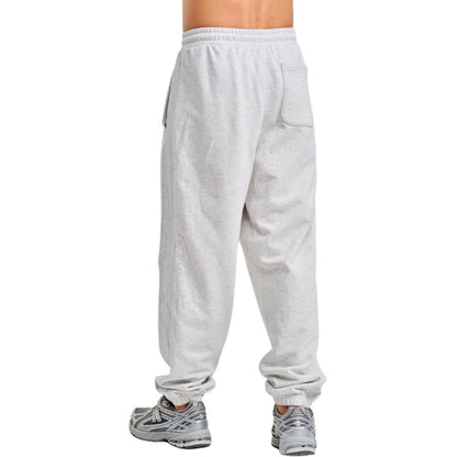 New Balance erkaklar uchun oq rangli tekis trikotaj torli shim