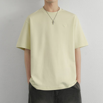 Hvga asosiy modellari eski pul uslubi yumshoq va qulay teri salqin tuyg'u yarim yengli pastki ko'ylak Amerika tekis rangli moda shaxsiyat trendi tasodifiy erkin qisqa qisma futbolkalar bir xil modellar bilan erkaklar va ayollar