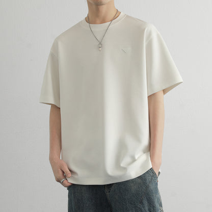 Hvga asosiy modellari eski pul uslubi yumshoq va qulay teri salqin tuyg'u yarim yengli pastki ko'ylak Amerika tekis rangli moda shaxsiyat trendi tasodifiy erkin qisqa qisma futbolkalar bir xil modellar bilan erkaklar va ayollar