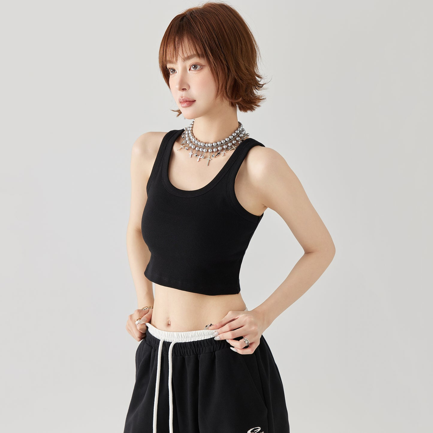 Golfkross asosiy qismi bir tekis tashqi kiyim yengsiz kamzulga qisqa qism shirin salqin shamol achchiq qiz ip ichida yuqori jilet ayol