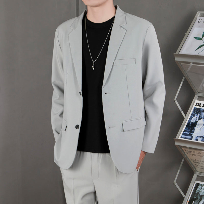 Ofisga qarshi engil hashamatli moda tasodifiy chiroyli bo'sh Gonkong uslubidagi gangster chiroyli ko'ylagi universal koreys versiyasi trendi uzun yengli kostyum erkaklar modellari