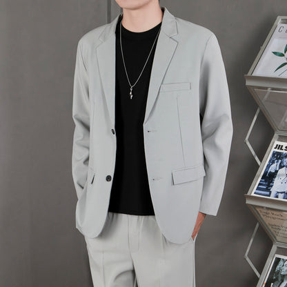 Ofisga qarshi engil hashamatli moda tasodifiy chiroyli bo'sh Gonkong uslubidagi gangster chiroyli ko'ylagi universal koreys versiyasi trendi uzun yengli kostyum erkaklar modellari