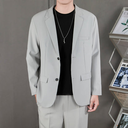 Ofisga qarshi engil hashamatli moda tasodifiy chiroyli bo'sh Gonkong uslubidagi gangster chiroyli ko'ylagi universal koreys versiyasi trendi uzun yengli kostyum erkaklar modellari