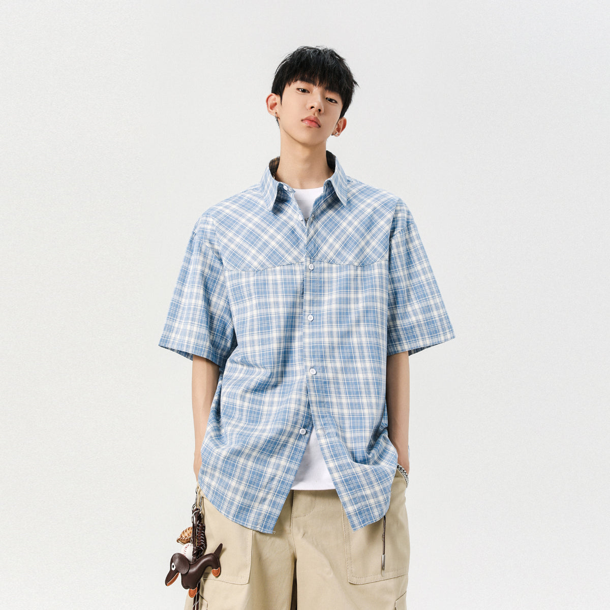 Balog'atga etmagan yaponiyalik Igoi har kuni bir xil modeldagi erkaklar va ayollarning qisqa yengli ko'ylaklari