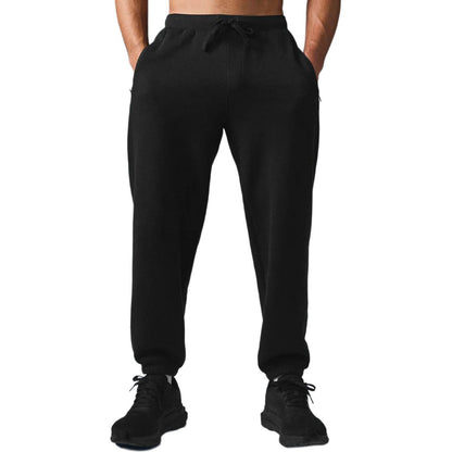 Alo yoga triumph restore bir xil rangdagi logotipi bosilgan, erkin ishlangan terli erkaklar shimlari