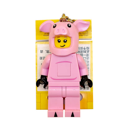 LEGO porlayotgan pushti cho'chqa kaliti (KE212H)