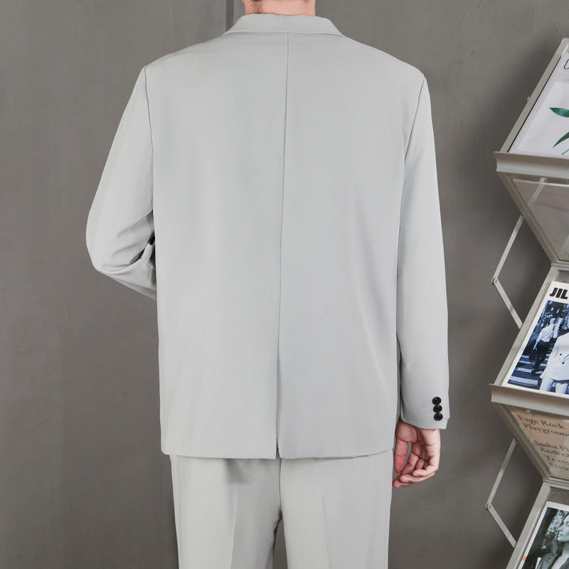 Ofisga qarshi engil hashamatli moda tasodifiy chiroyli bo'sh Gonkong uslubidagi gangster chiroyli ko'ylagi universal koreys versiyasi trendi uzun yengli kostyum erkaklar modellari