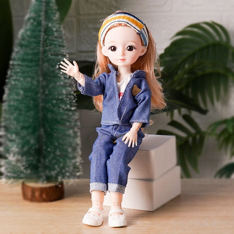 Tumi Barbie libosli qo'g'irchog'i