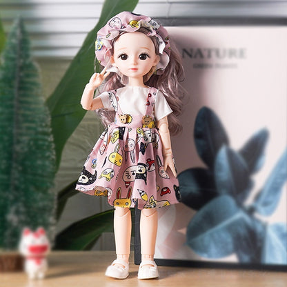 Tumi Barbie libosli qo'g'irchog'i