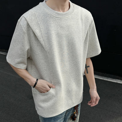 Paddy Julia bir xil rangdagi toza to'rtburchakli yelkali siluet, dekonstruksiya qilingan katta tuyg'usi yumaloq bo'yinli bo'shashgan yelkali ko'p qirrali besh chorak yengli qisqa yengli futbolka bir xil modeldagi erkaklar va ayollar