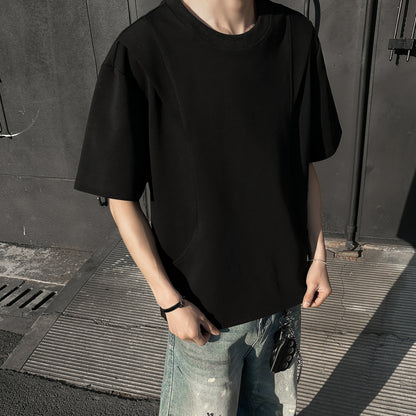 Paddy Julia bir xil rangdagi toza to'rtburchakli yelkali siluet, dekonstruksiya qilingan katta tuyg'usi yumaloq bo'yinli bo'shashgan yelkali ko'p qirrali besh chorak yengli qisqa yengli futbolka bir xil modeldagi erkaklar va ayollar