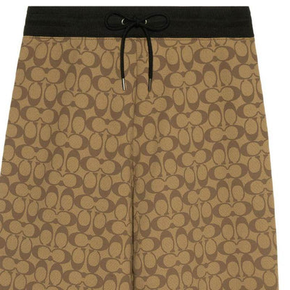 Брюки женские Coach Fw22 Logo Full Print - Boxette Shop