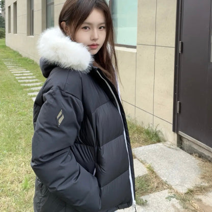 Пуховик женский Skechers