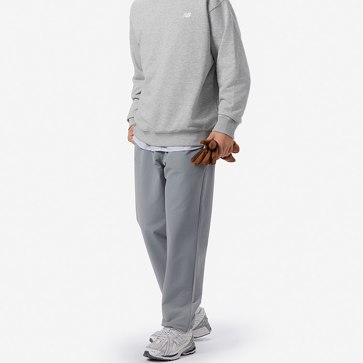 New Balance erkaklar uchun kulrang tekis rangli oʻrta uzunlikdagi tekis oyoqli shim