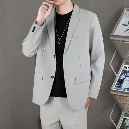 Ofisga qarshi engil hashamatli moda tasodifiy chiroyli bo'sh Gonkong uslubidagi gangster chiroyli ko'ylagi universal koreys versiyasi trendi uzun yengli kostyum erkaklar modellari