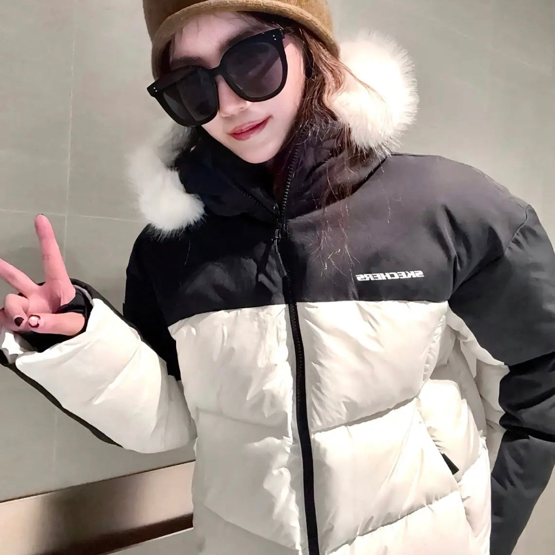 Пуховик женский Skechers