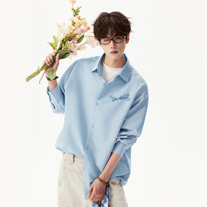 Pal ongaco pal ongaco Amerika yuqori ko'cha asosiy modellari oddiy sof paxta tanasi harflari brend logotipi bosma erkin tasodifiy universal koreys tekis rangli lapel uzun yengli ko'ylaklar bir xil modellar bilan erkaklar va ayollar