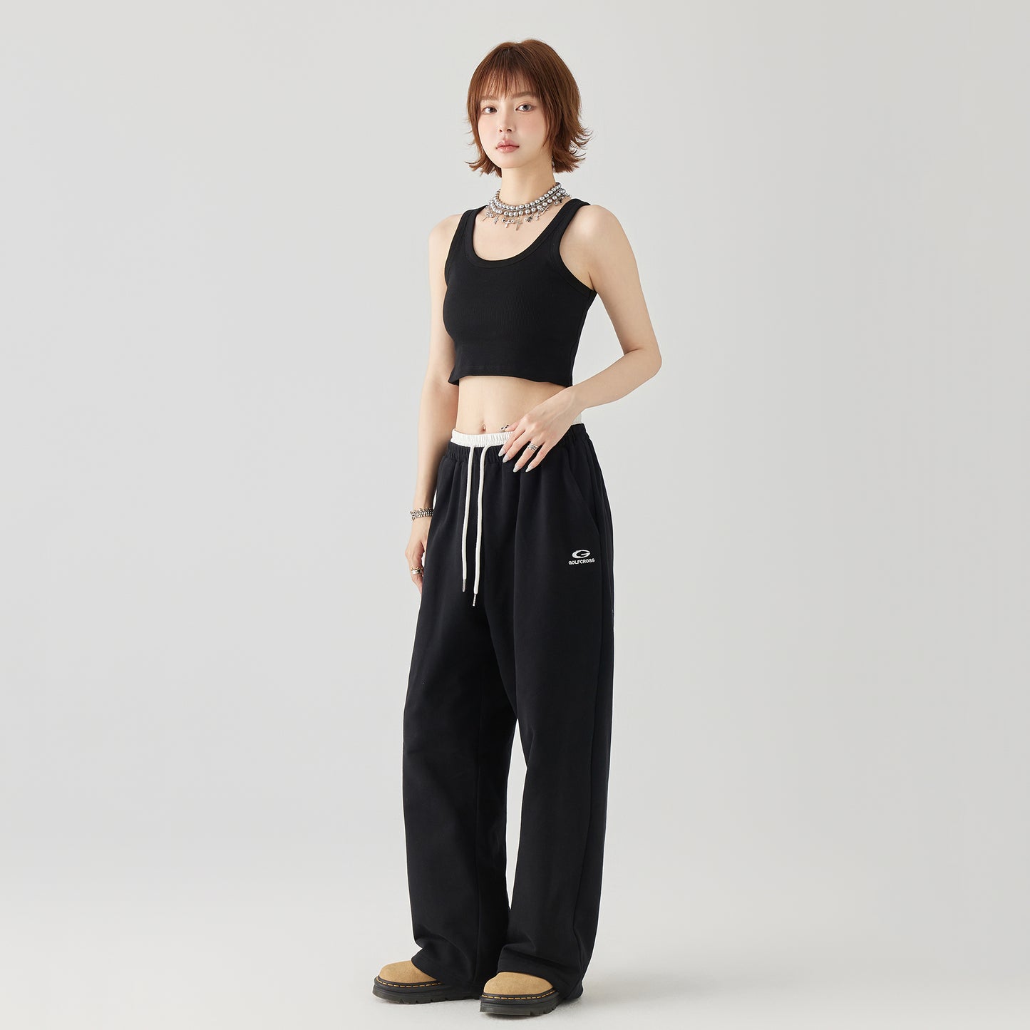 Golfkross asosiy qismi bir tekis tashqi kiyim yengsiz kamzulga qisqa qism shirin salqin shamol achchiq qiz ip ichida yuqori jilet ayol