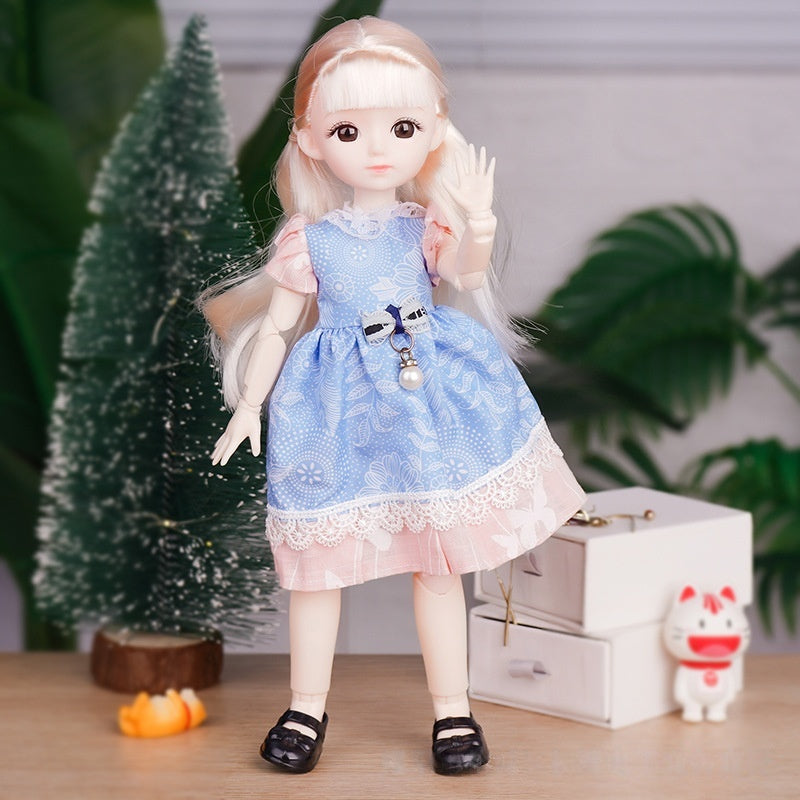 Tumi Barbie libosli qo'g'irchog'i