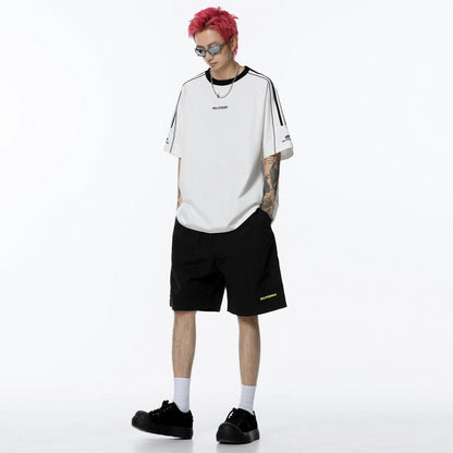 Kollej uslubidagi golfkross rangli to'qnashuv lentasi chiziqli yelkali yengli dumaloq bo'yinli qisqa yengli futbolka bir xil paragrafli erkaklar va ayollar