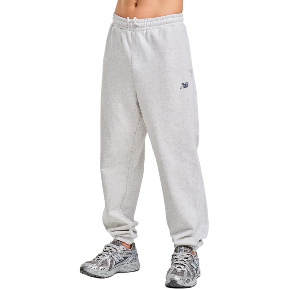 New Balance erkaklar uchun oq rangli tekis trikotaj torli shim