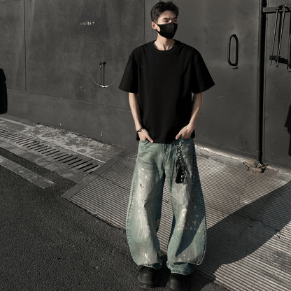 Paddy Julia bir xil rangdagi toza to'rtburchakli yelkali siluet, dekonstruksiya qilingan katta tuyg'usi yumaloq bo'yinli bo'shashgan yelkali ko'p qirrali besh chorak yengli qisqa yengli futbolka bir xil modeldagi erkaklar va ayollar