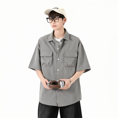 Igoi Amerika yuqori ko'chada qulay moda ish kiyimi nozik kesilgan tasodifiy ko'p qirrali tekis rangli oddiy bo'sh lapel qisqa yengli ko'ylaklar erkaklar va ayollar bir xil