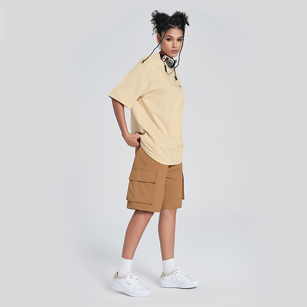 Reebok moda yo'nalishi Amerika oddiy qulay yuz dumaloq bo'yinli sport erkin qisqa yengli nafas oladigan dopaminli futbolka erkaklar va ayollar bej