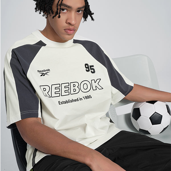 Reebok erkaklar futbolkasi