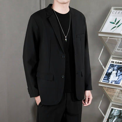 Ofisga qarshi engil hashamatli moda tasodifiy chiroyli bo'sh Gonkong uslubidagi gangster chiroyli ko'ylagi universal koreys versiyasi trendi uzun yengli kostyum erkaklar modellari